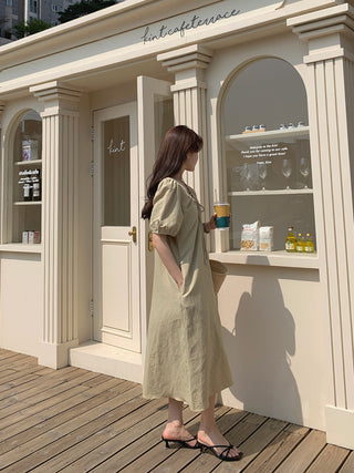 V-neck pleated dress