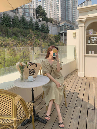 V-neck pleated dress