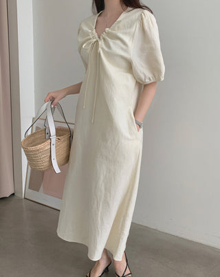 V-neck pleated dress