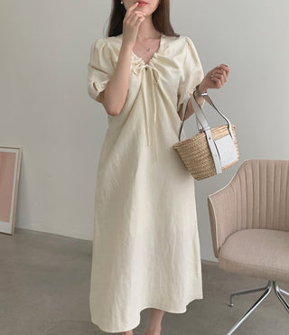 V-neck pleated dress