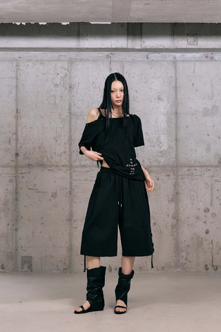 Cross-punched half tee