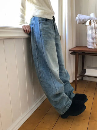 Line Curve Washed Balloon Jeans