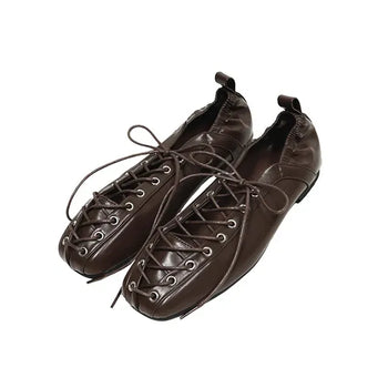 Tod's Eyelet Flat Shoes