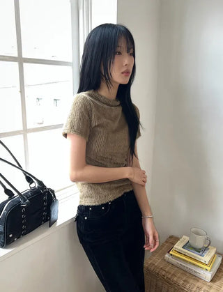 Long handle perforated shoulder bag