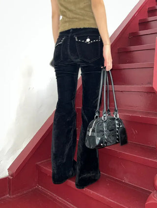 Long handle perforated shoulder bag