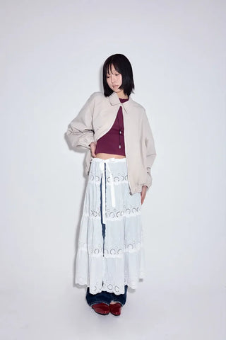 Hose punched layered skirt