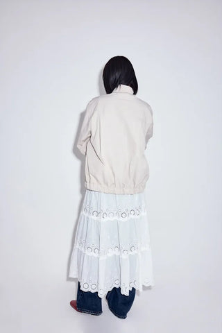 Hose punched layered skirt