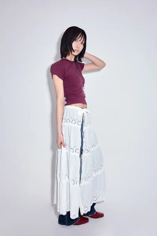 Hose punched layered skirt