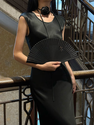 black oblique dress