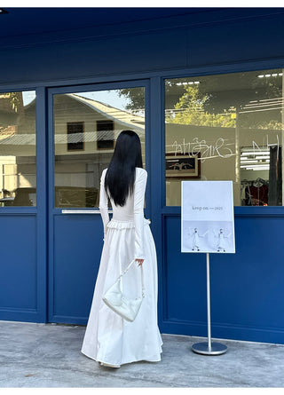 white pleated dress