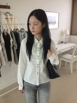Two-button cut-out shirred busquet long-sleeve shirt