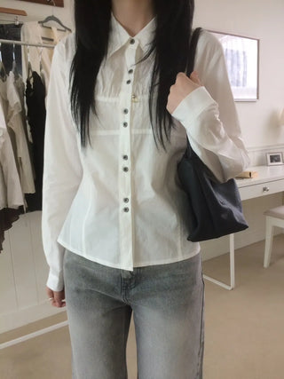 Two-button cut-out shirred busquet long-sleeve shirt