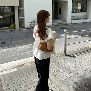Voluminous peplum blouse