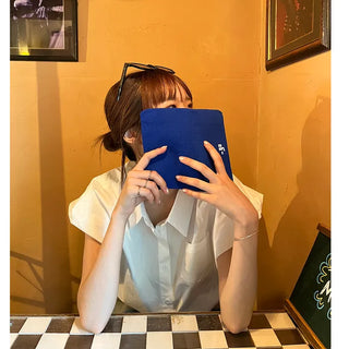 Puff-sleeve shirred shirt