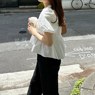 Voluminous peplum blouse