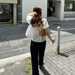 Voluminous peplum blouse