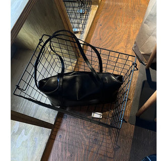 Slide pocket shoulder bag