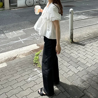 Voluminous peplum blouse