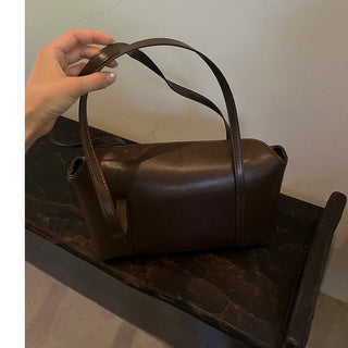 Slide pocket shoulder bag