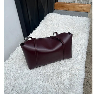 Slide pocket shoulder bag