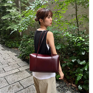 Slide pocket shoulder bag