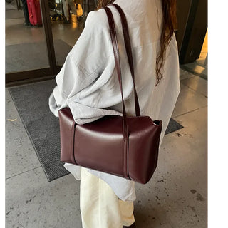 Slide pocket shoulder bag