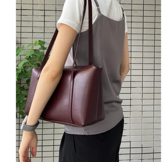 Slide pocket shoulder bag