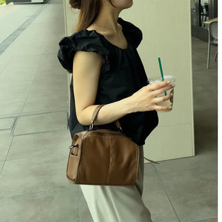 Shirred puff ribbon blouse