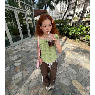 Checked feminine blouse