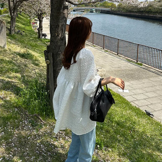 Voluminous feminine tunic