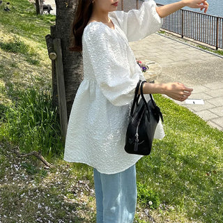 Voluminous feminine tunic