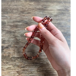 Clear brown ball necklace