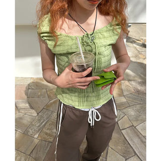 Checked feminine blouse