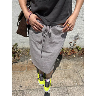Bordered string midi skirt