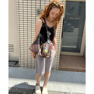 Bordered string midi skirt