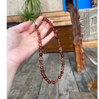 Clear brown ball necklace