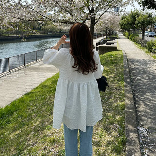 Voluminous feminine tunic
