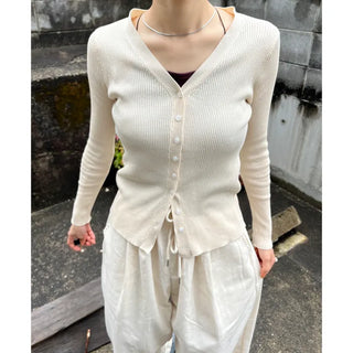 V-neck cardigan with waist-defining belt