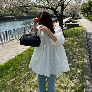 Voluminous feminine tunic