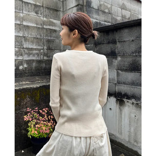 V-neck cardigan with waist-defining belt