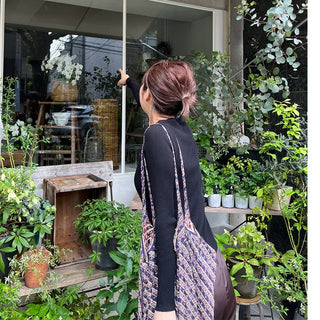 V-neck cardigan with waist-defining belt
