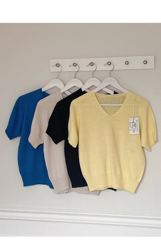 Minimal whole garment V-neck knit