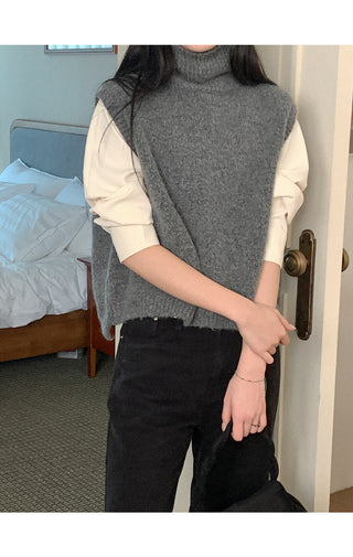 Asymmetrical high-neck vest