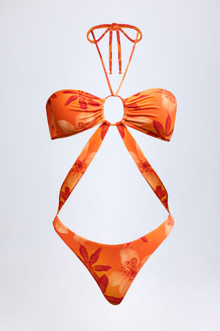 Cut-Out Halterneck Swimsuit in Orange Orchid Print
