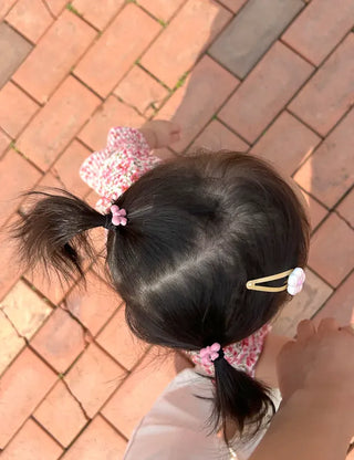 Set of mini elastic hair ties for children and girls.