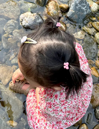 Set of mini elastic hair ties for children and girls.