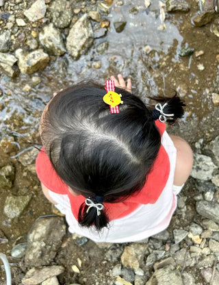 Set of mini elastic hair ties for children and girls.