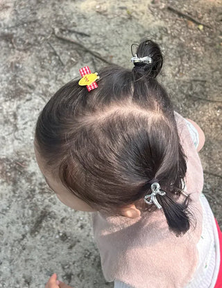 Set of mini elastic hair ties for children and girls.