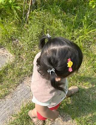 Set of mini elastic hair ties for children and girls.