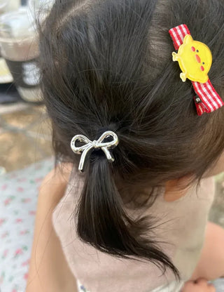 Set of mini elastic hair ties for children and girls.